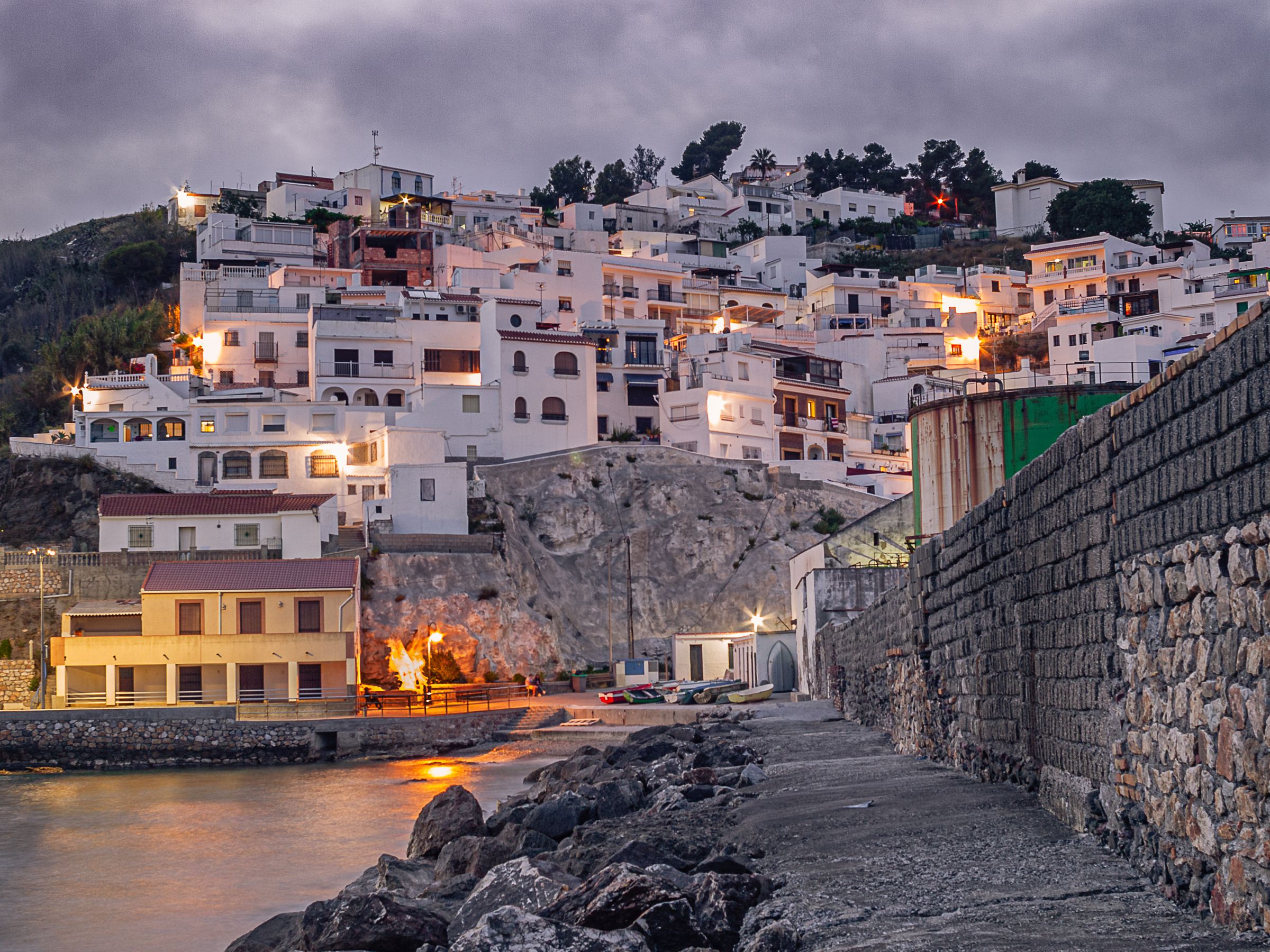 A white Andalusian coastal village above the sea
